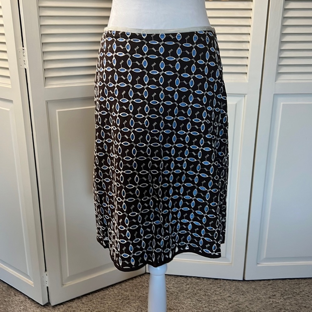 Snak from Anthropologie cutout skirt with blue lining